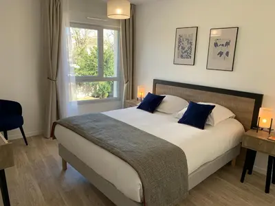 Un ou plusieurs lits dans un hébergement de l'établissement Domitys Villa Kera