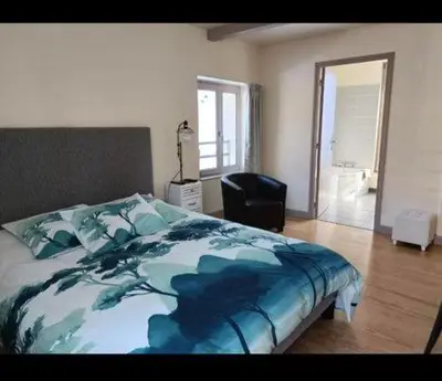 Un ou plusieurs lits dans un hébergement de l'établissement Auberge du Pont