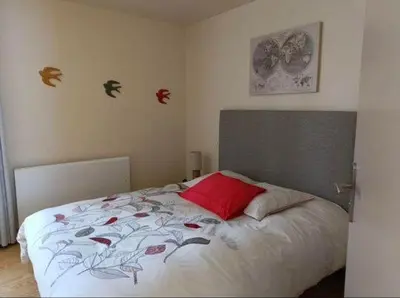Un ou plusieurs lits dans un hébergement de l'établissement Auberge du Pont