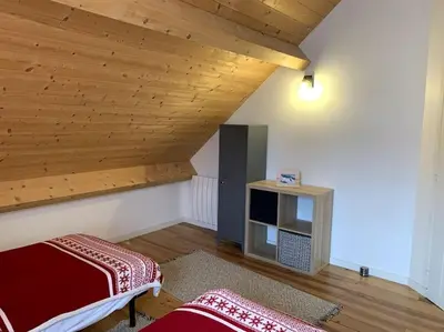 Un ou plusieurs lits dans un hébergement de l'établissement Chalet Las Abelhas