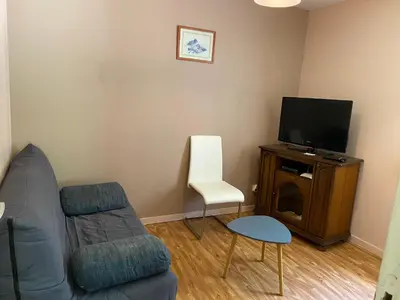 Télévision ou salle de divertissement dans l'établissement gite du mondou