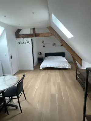 Un ou plusieurs lits dans un hébergement de l'établissement Studio à Centre ville de BRIVE LA GAILLARDE