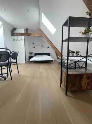 Un ou plusieurs lits dans un hébergement de l'établissement Studio à Centre ville de BRIVE LA GAILLARDE
