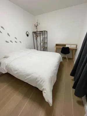 Un ou plusieurs lits dans un hébergement de l'établissement Appartement T2 à centre ville