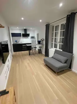 Cuisine ou kitchenette dans l'établissement Appartement T2 à centre ville
