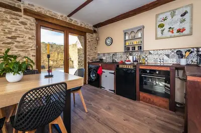 Cuisine ou kitchenette dans l'établissement Gîte du Pacha