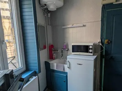 Cuisine ou kitchenette dans l'établissement Le nid douillet Industriel