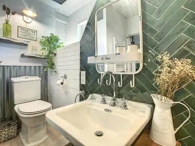 Salle de bains dans l'établissement Le Grenier du Buronnier