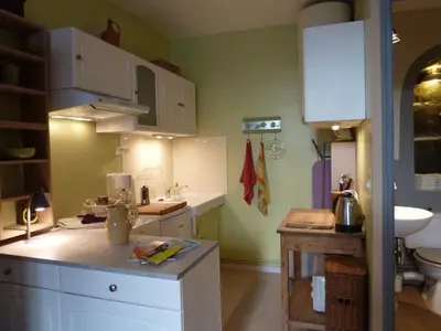Cuisine ou kitchenette dans l'établissement L'Oustal du Sentier