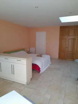 Un ou plusieurs lits dans un hébergement de l'établissement Chambre d'hôte La Blénie