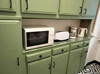 Cuisine ou kitchenette dans l'établissement Le nid douillet Vintage