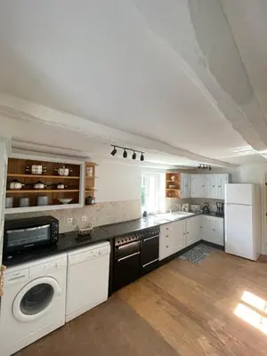 Cuisine ou kitchenette dans l'établissement Gîte Les Camélis