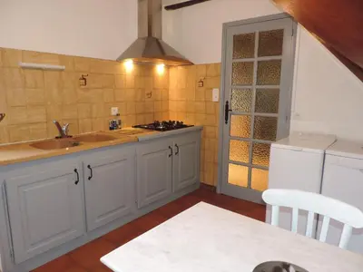 Cuisine ou kitchenette dans l'établissement Charmante maison de campagne