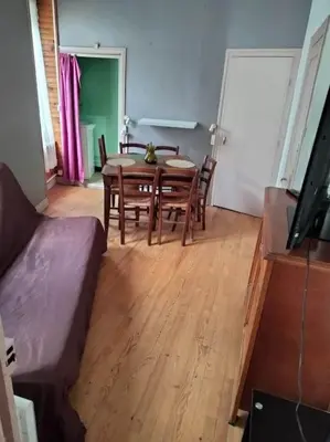 Coin salon dans l'établissement Le nid douillet Rustique Linge fourni