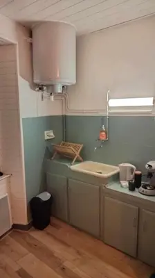 Cuisine ou kitchenette dans l'établissement Le nid douillet Champêtre Linge fourni