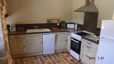 Cuisine ou kitchenette dans l'établissement Domaine de Nalou - Gîte