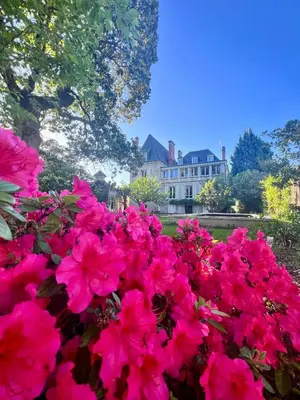 Jardin de l'établissement Demeure de Flore - Hôtel Particulier au Cœur de Brive comprenant 8 appartements de charme