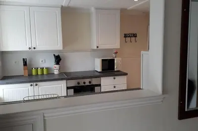 Cuisine ou kitchenette dans l'établissement Gîte Maison du Trottoir, Sussac