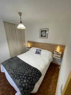 Un ou plusieurs lits dans un hébergement de l'établissement Les Thermes 25 Le Mont Dore
