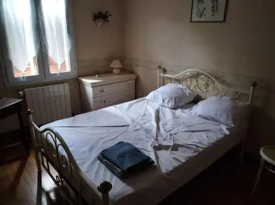 Un ou plusieurs lits dans un hébergement de l'établissement Chez Coco maison au coeur du parc régional du Quercy