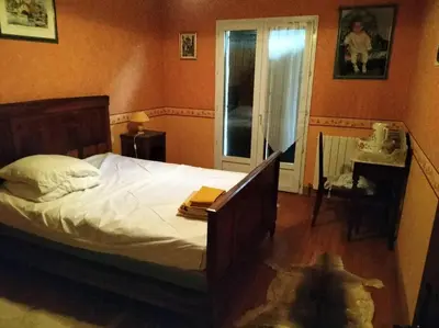 Un ou plusieurs lits dans un hébergement de l'établissement Chez Coco maison au coeur du parc régional du Quercy