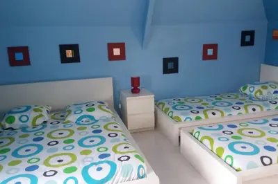 Un ou plusieurs lits dans un hébergement de l'établissement Villa de charme la Vinadière avec piscine privée et chauffée