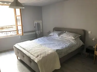 Un ou plusieurs lits dans un hébergement de l'établissement Townhouse in Mur de Barrez