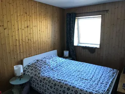 Un ou plusieurs lits dans un hébergement de l'établissement Appartement spacieux au cœur du massif du Sancy