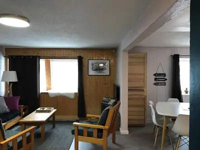 Coin salon dans l'établissement Appartement spacieux au cœur du massif du Sancy