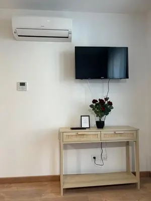 Télévision ou salle de divertissement dans l'établissement Blum