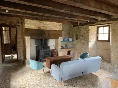 Coin salon dans l'établissement Charmante maison périgourdine