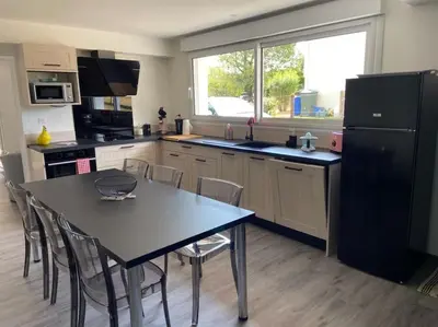 Cuisine ou kitchenette dans l'établissement appartement 