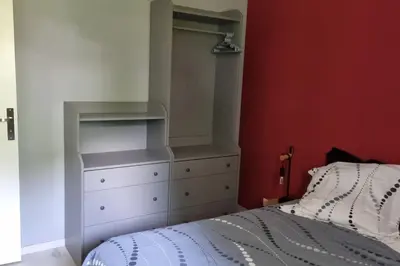 Un ou plusieurs lits dans un hébergement de l'établissement appartement 