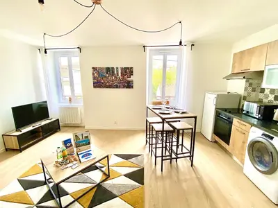 Cuisine ou kitchenette dans l'établissement L'Arlequin, cosy et calme