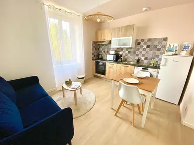 Cuisine ou kitchenette dans l'établissement L'Aristide, calme et moderne