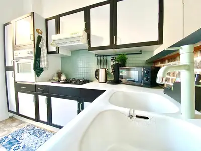 Cuisine ou kitchenette dans l'établissement Le Marceau, spacieux et chaleureux