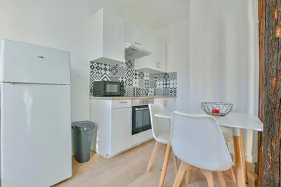 Cuisine ou kitchenette dans l'établissement Le Coeur de Limoges, en hypercentre