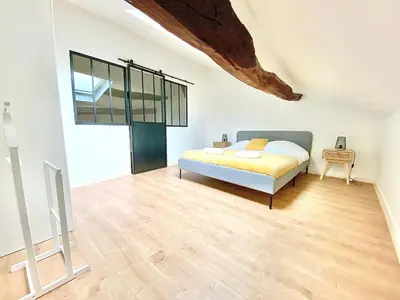 Un ou plusieurs lits dans un hébergement de l'établissement Le Duplex, magnifique centre historique