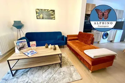 Coin salon dans l'établissement Le Monet, spacieux avec terrasse privée