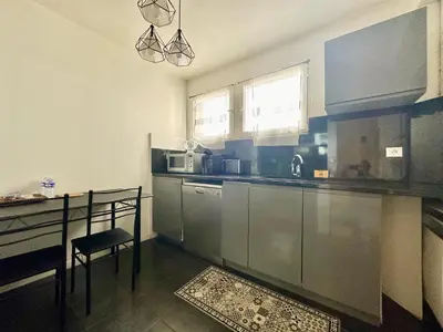 Cuisine ou kitchenette dans l'établissement Le Montjovis, spacieux et lumineux avec garage