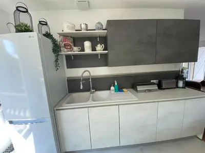 Cuisine ou kitchenette dans l'établissement Gite-le-7