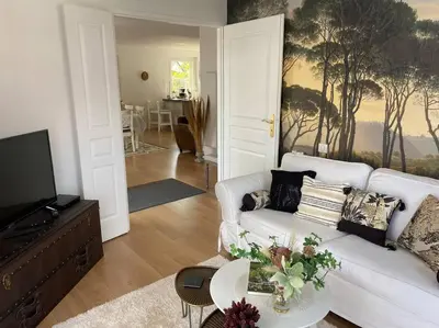 Télévision ou salle de divertissement dans l'établissement Gite-le-7