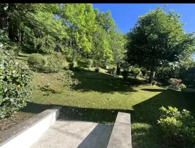 Jardin de l'établissement Appartement Le feron