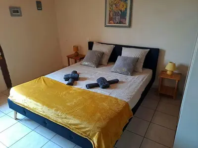 Un ou plusieurs lits dans un hébergement de l'établissement Maison COUNORD - Gite pour 8 personnes