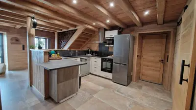 Cuisine ou kitchenette dans l'établissement La ferme de Jouane
