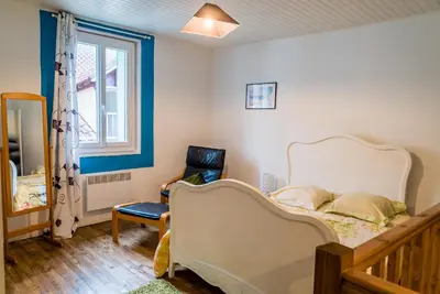 Un ou plusieurs lits dans un hébergement de l'établissement Maison agréable en centre historique