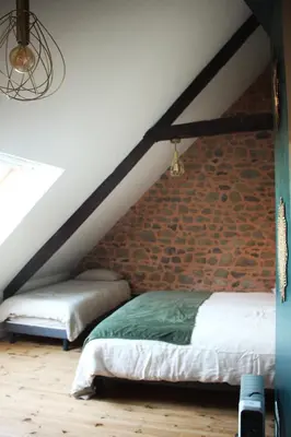Un ou plusieurs lits dans un hébergement de l'établissement Gîte Au gré du vent - 12 personnes - Calme, nature et confort