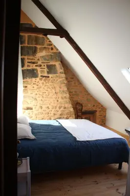 Un ou plusieurs lits dans un hébergement de l'établissement Gîte Au gré du vent - 12 personnes - Calme, nature et confort