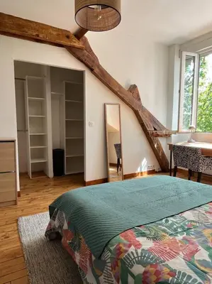 Un ou plusieurs lits dans un hébergement de l'établissement Duplex de charme en centre ville avec terrasse