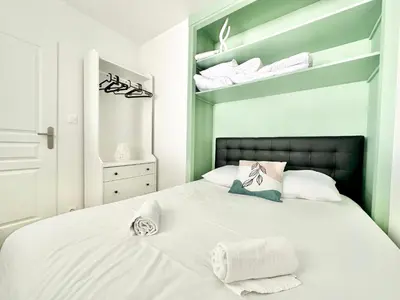 Un ou plusieurs lits dans un hébergement de l'établissement La Green Room, douillet et paisible